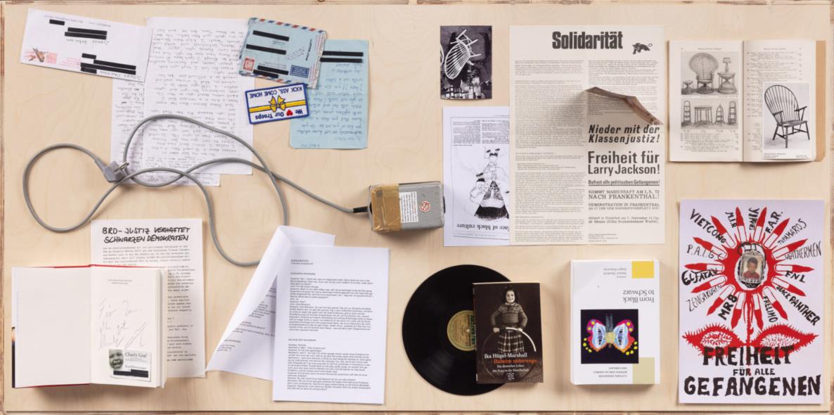James Gregory Atkinson, Zeitkapsel Transformer, 2021, photography, documents, transformer, books, various materials, installation view ‘6 Friedberg-Chicago’, Dortmunder Kunstverein Courtesy: the artist, Archiv des Hamburger Instituts für Sozialforschung, Germericans (Sabrina und Marvin Kuhn), Ika Hügel-Marshall, The Lisbet Tellefsen Collection, Tyrown Vincent, Dortmunder Kunstverein Photo: Roland Baege