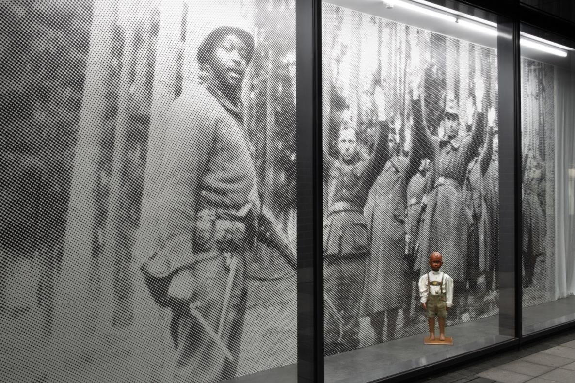 James Gregory Atkinson, Your Job in Germany, 2021, wall paper, mannequin, lederhosen, installation view, ‘6 Friedberg-Chicago’, Dortmunder Kunstverein  Courtesy: the artist, Dortmunder Kunstverein Photo: Jens Franke